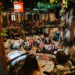 Guests dining at Nikos taverna at Mamma Mia The Party