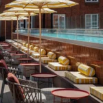 Sunlit courtyard pool at Villa Copenhagen, a Strawberry hotel