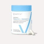 Happy V Prebiotic and Probiotic supplement bottle on a neutral background