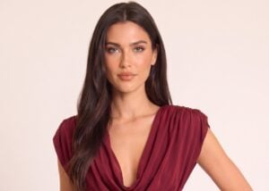 Wine shoulder pad draped mini dress by Rebellious Fashion