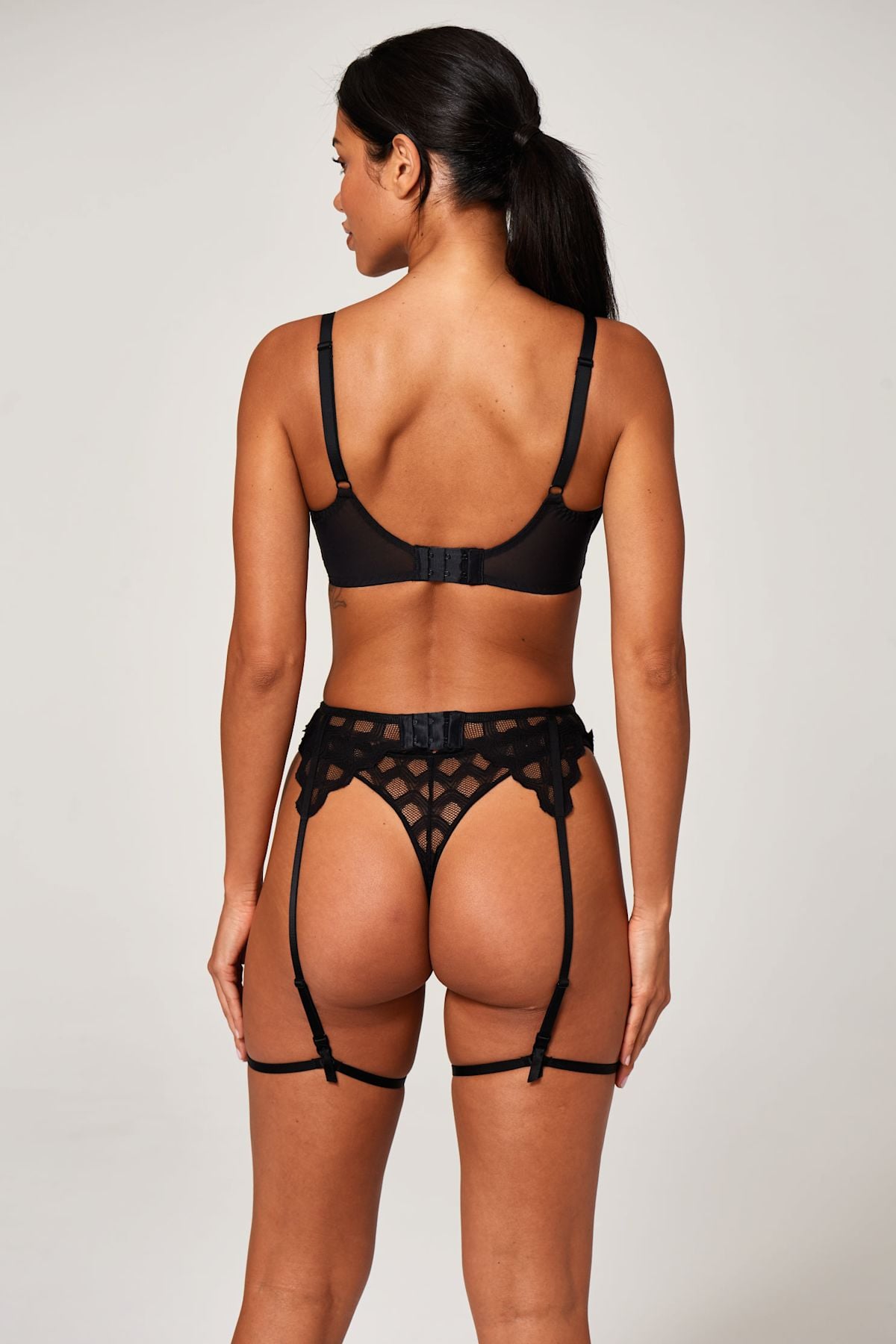 Model wearing the Esmae Bra in black