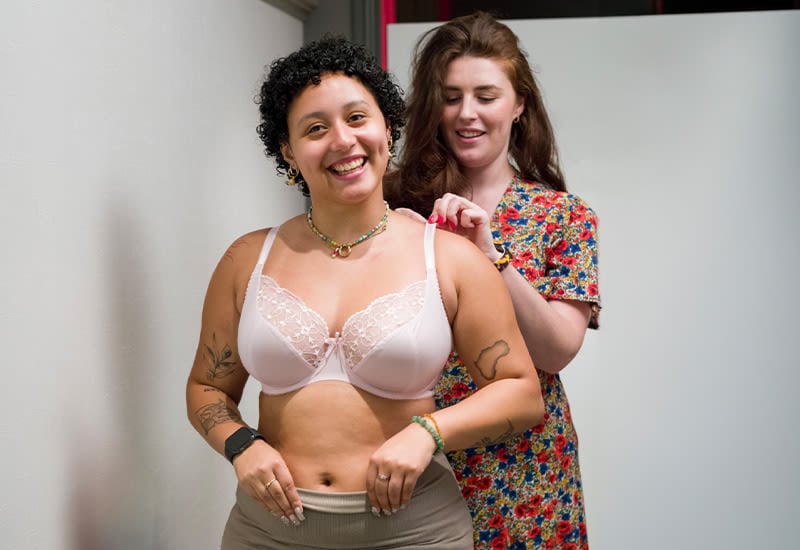 A Bravissimo fitting scene illustrating the brand's fitting service