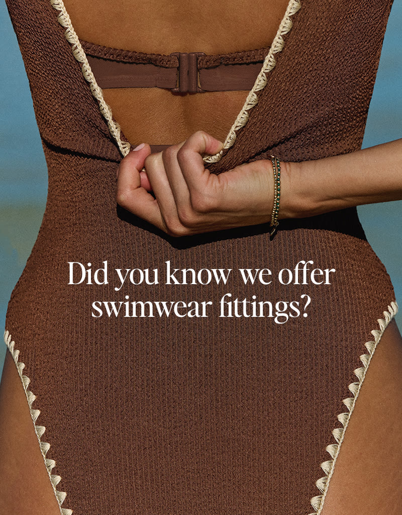 Bravissimo swimwear model in a poolside setting