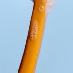 Orange Cocobrush with blue bristles and foam