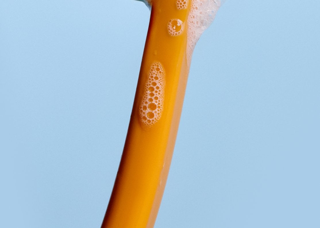 Orange Cocobrush with blue bristles and foam
