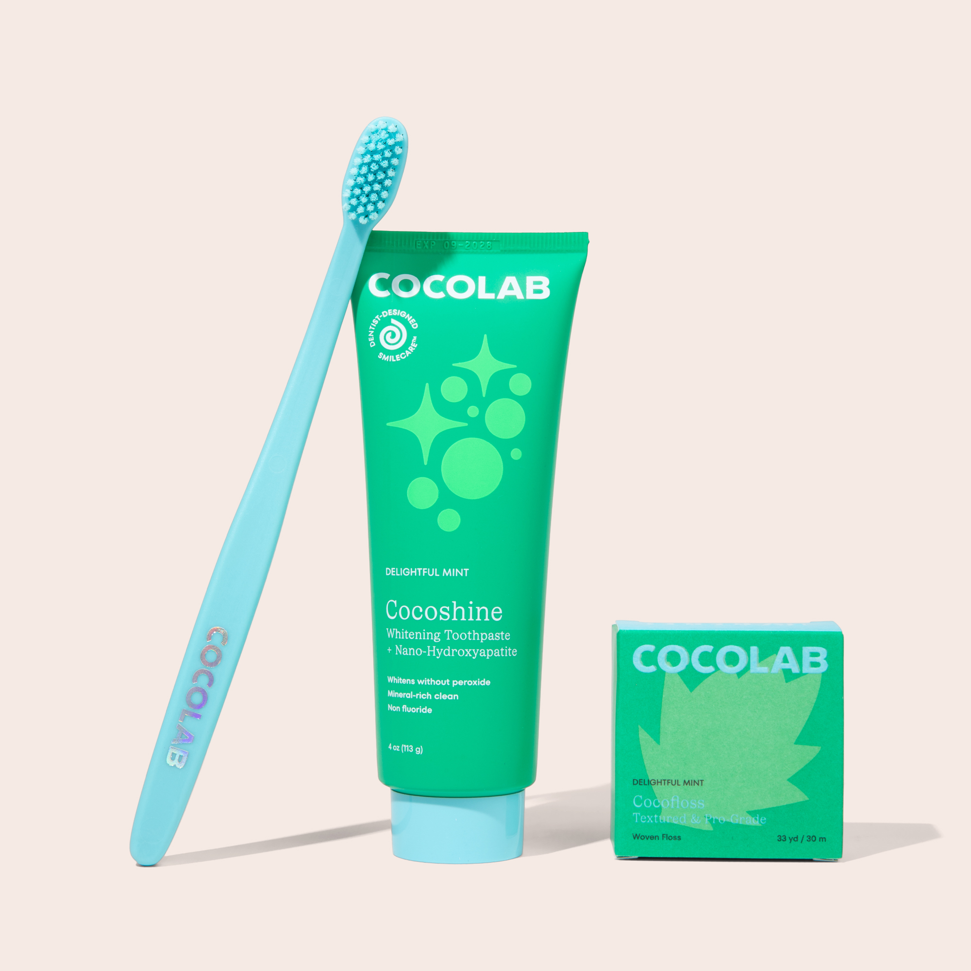 Cocofloss SmileCare products arranged in the Blue Skies colorway
