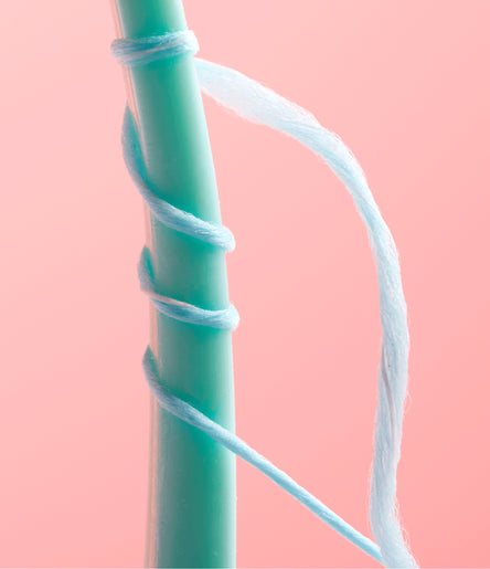 Close view of Cocofloss woven floss texture