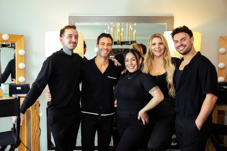 Glamsquad beauty professionals standing together at an event glam suite