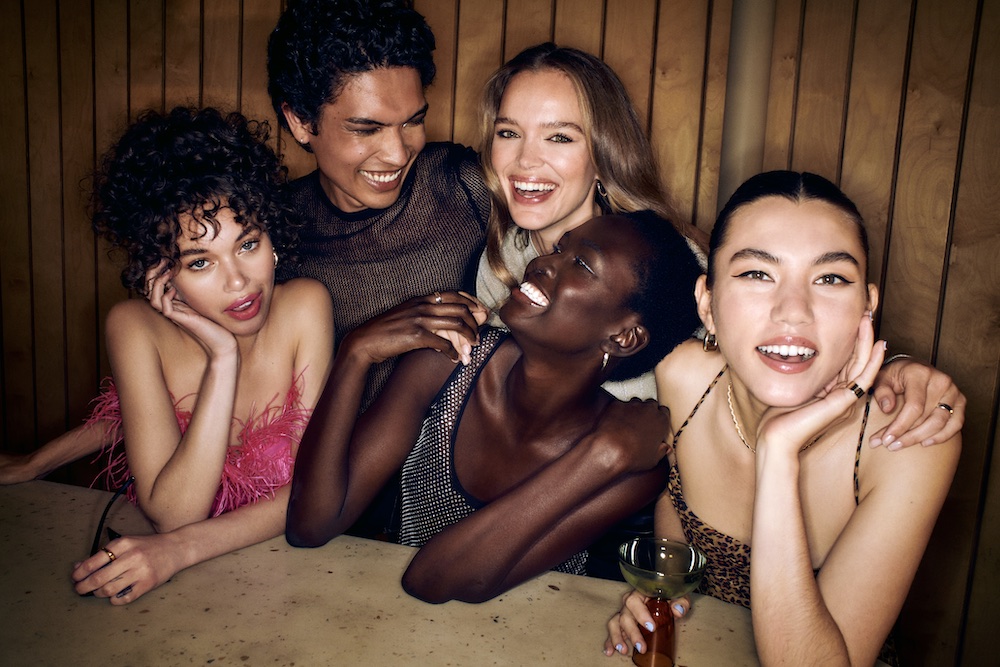 Friends with event-ready hair and makeup at a party