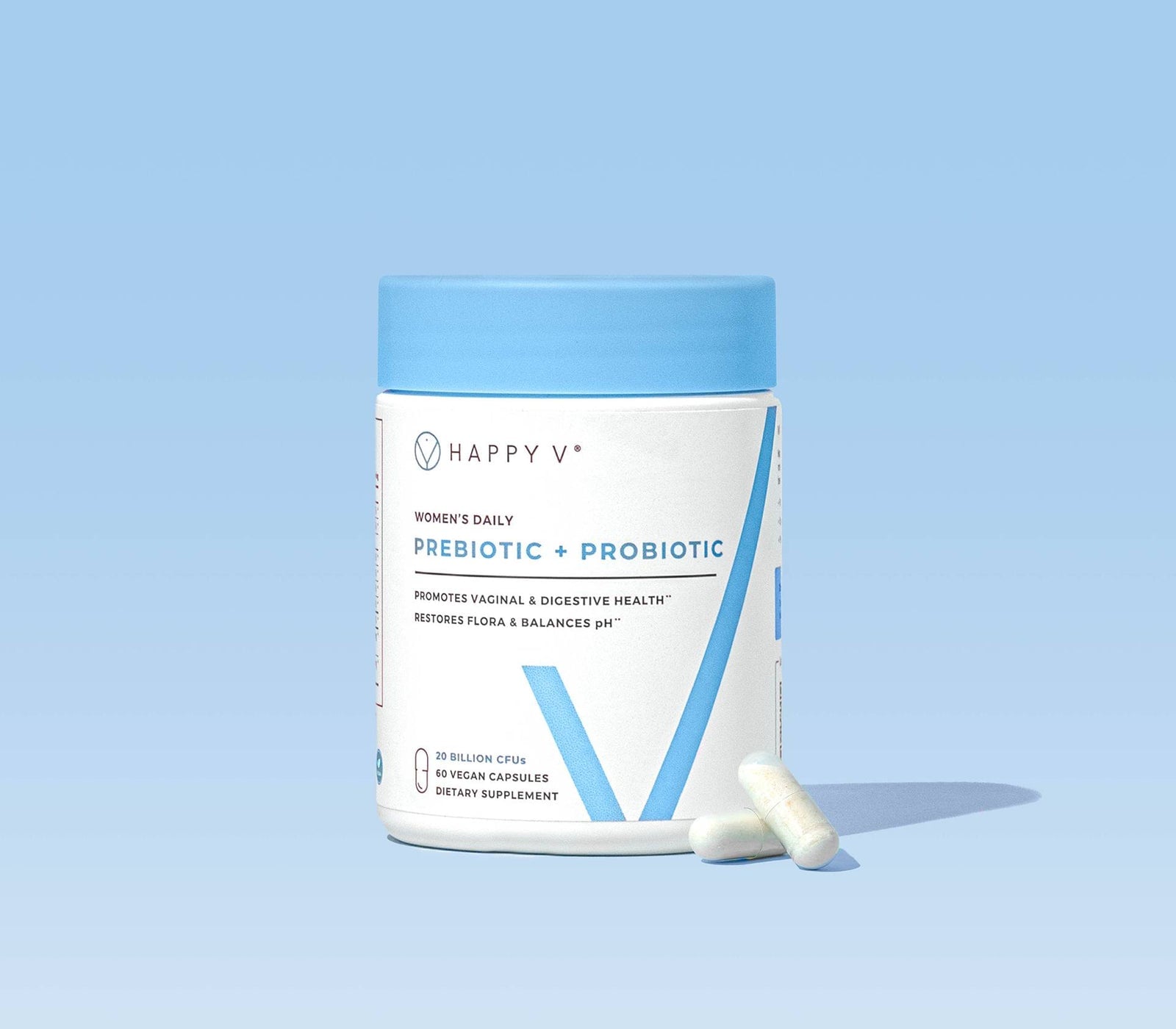 Happy V Prebiotic + Probiotic jar and capsules on a pale blue surface