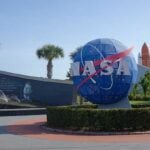 Visitors approach the Kennedy Space Center entrance