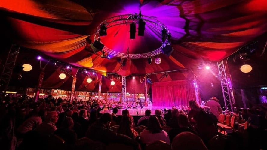 People watching a performance inside a Spiegel theatre