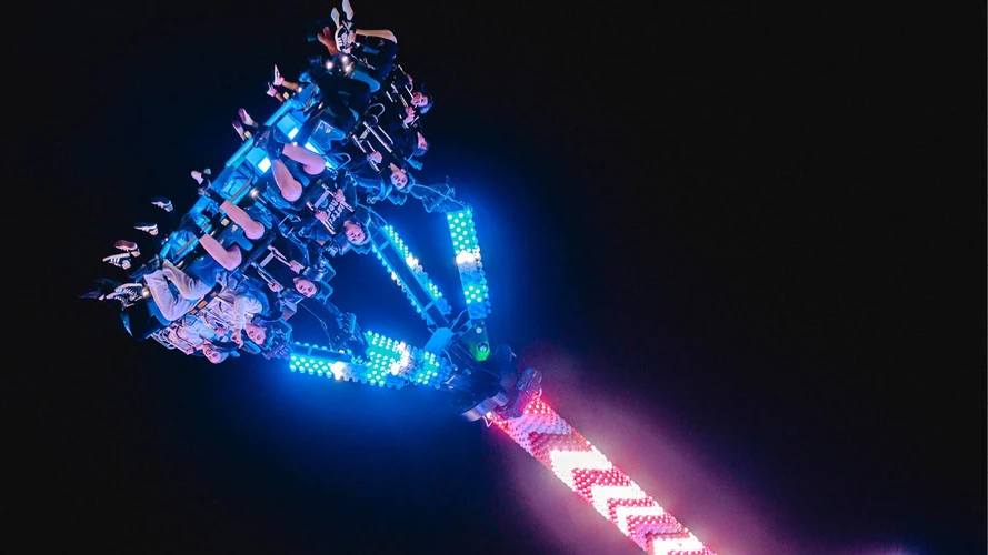 Colourful illuminated amusement ride at Spooktacular Glasgow