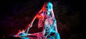 Illuminated skeleton decoration at a Halloween attraction