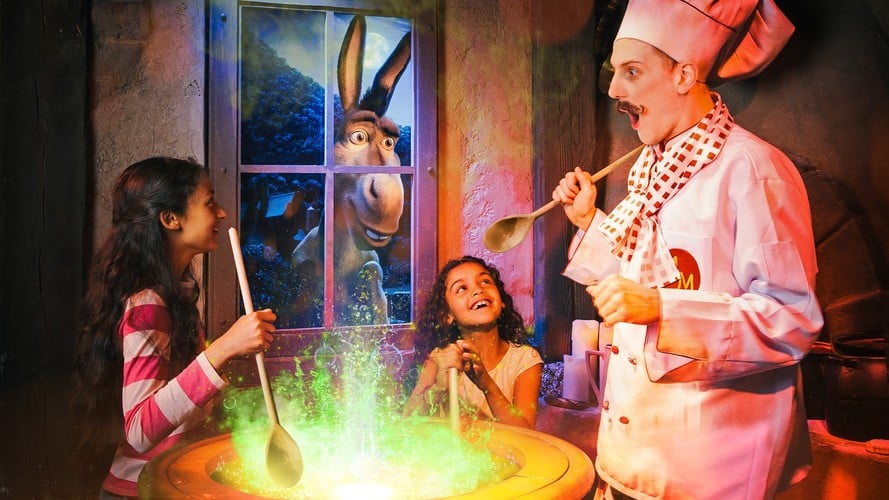Children meeting a chef and Donkey at Shrek’s Adventure London