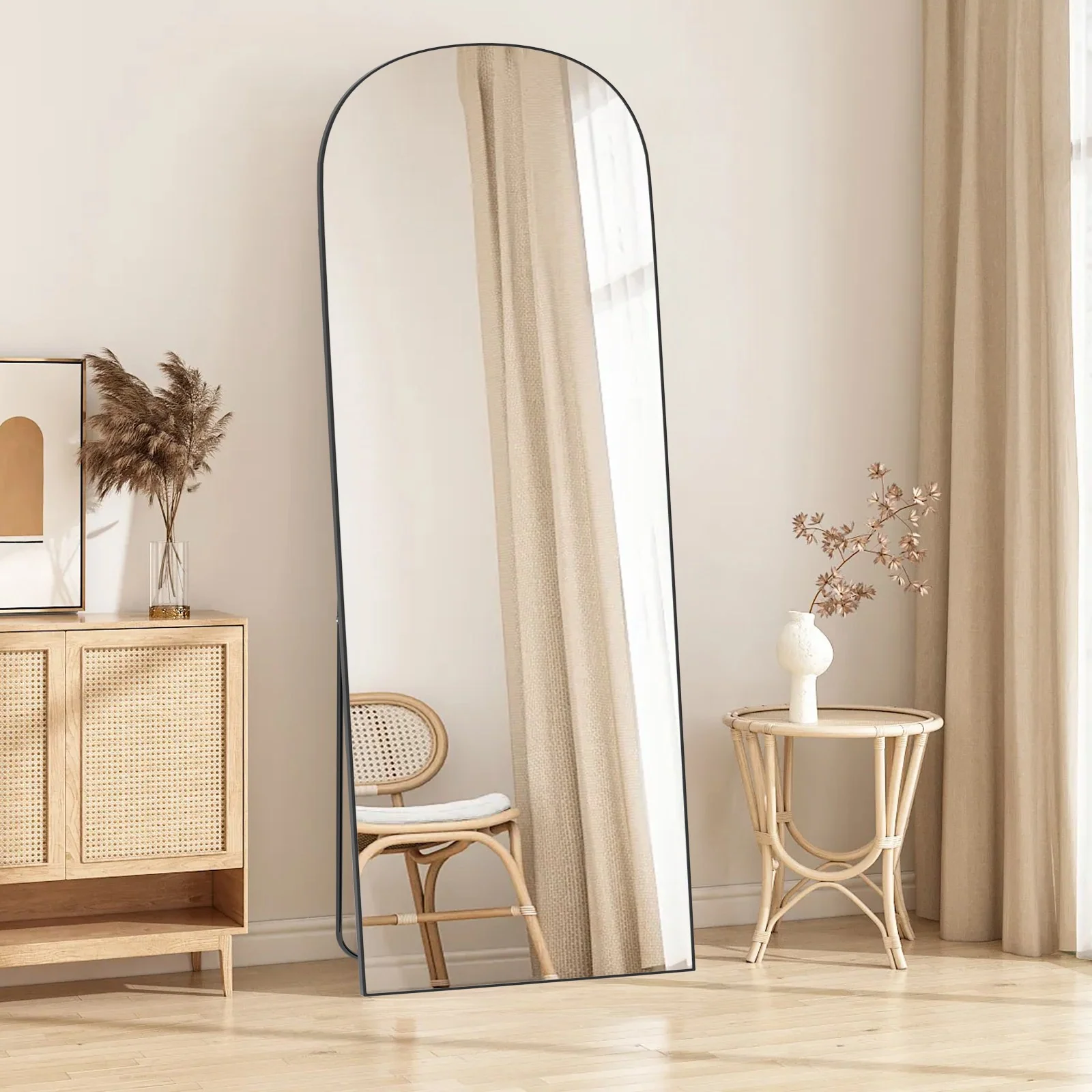 Arched full-length mirror with a freestanding metal frame