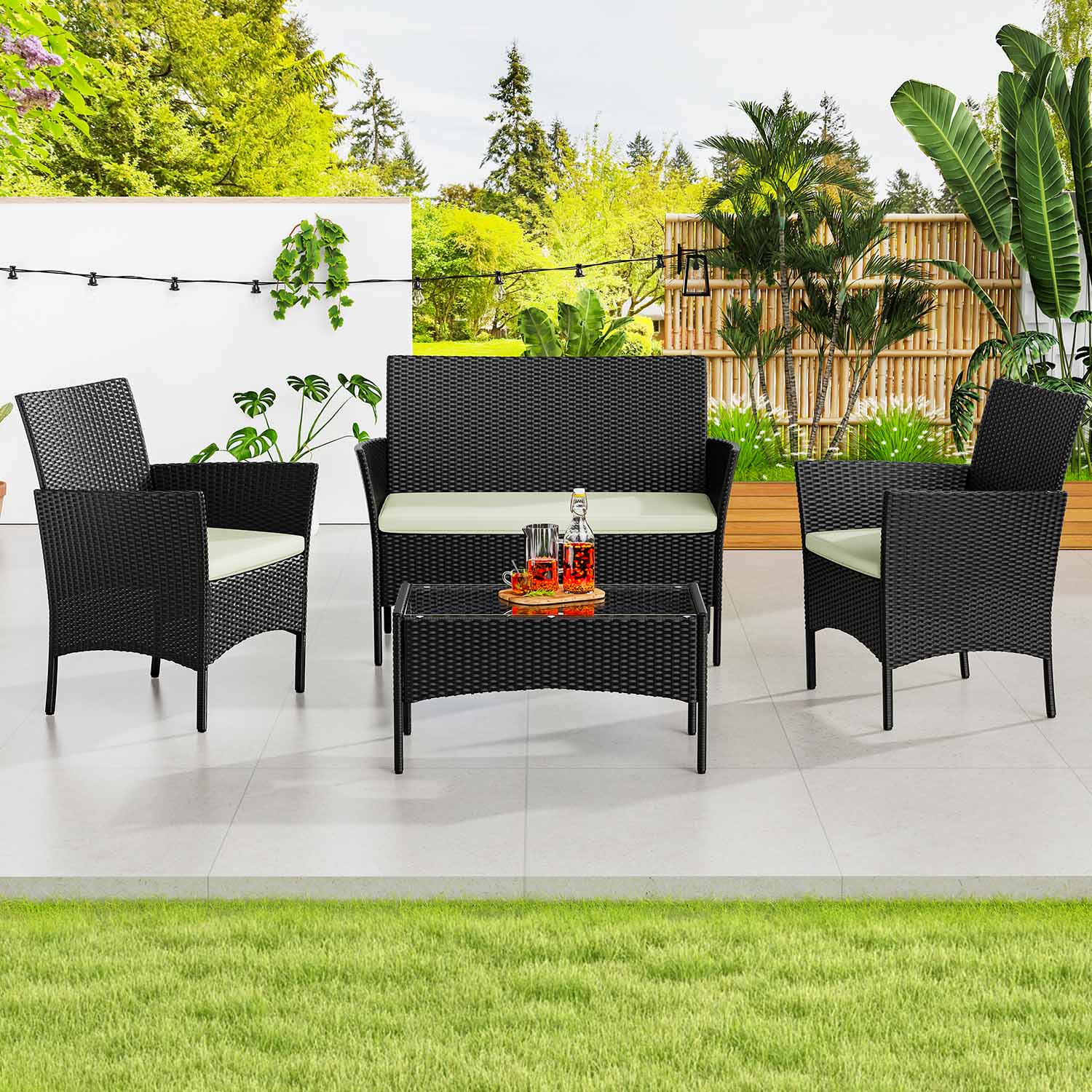 Four-seater rattan patio set with chairs, sofa and table