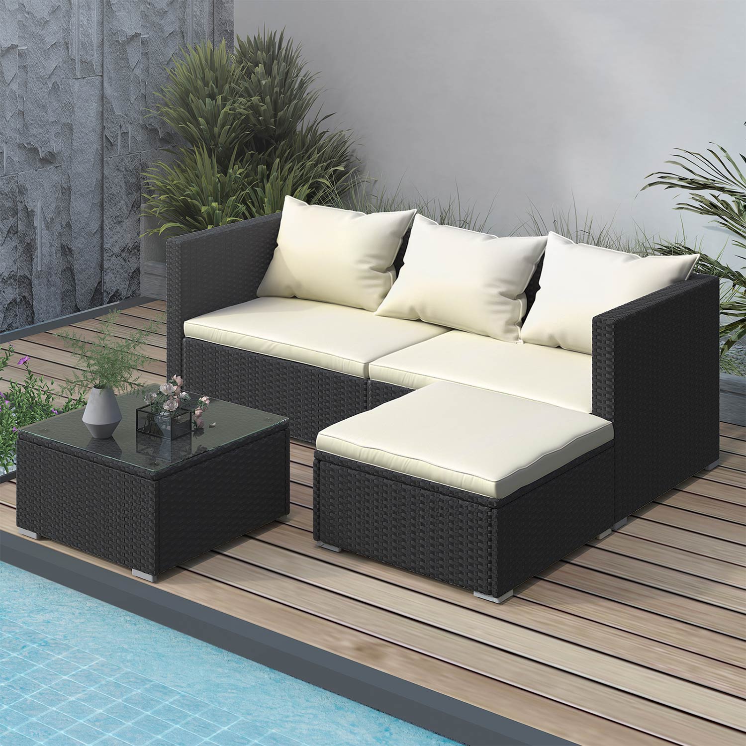 RattanTree outdoor sofa set with pale cushions and glass table