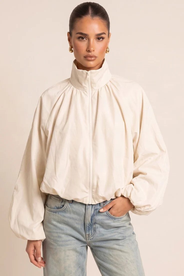 Cream bomber jacket with funnel neckline and gathered hem
