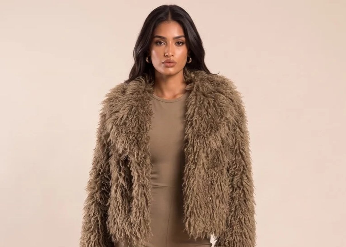 Model wearing the brown shaggy faux fur Elsie jacket