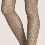 Leopard print sheer tights styled on a model