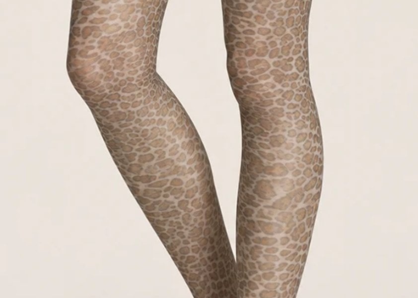 Leopard print sheer tights styled on a model