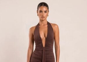 Model wearing a chocolate halterneck maxi dress