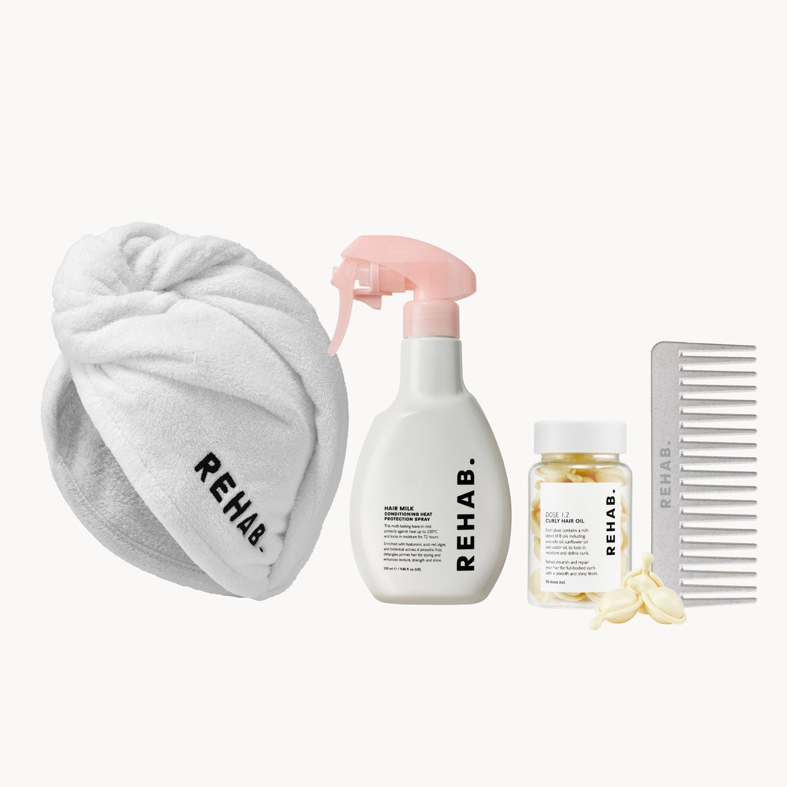 REHAB Curly Hair Routine products arranged together