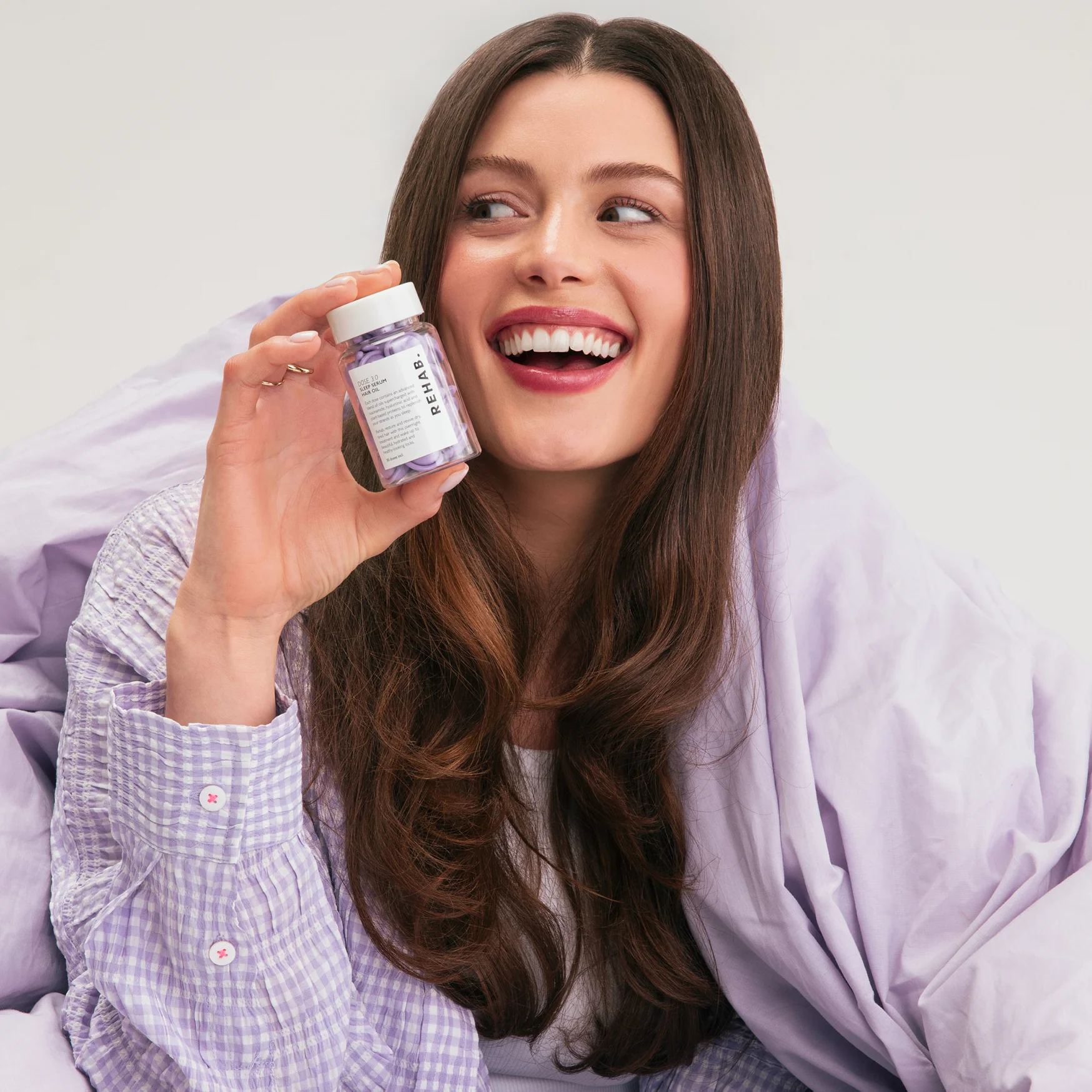Model beside REHAB Post Party Sleep Set products