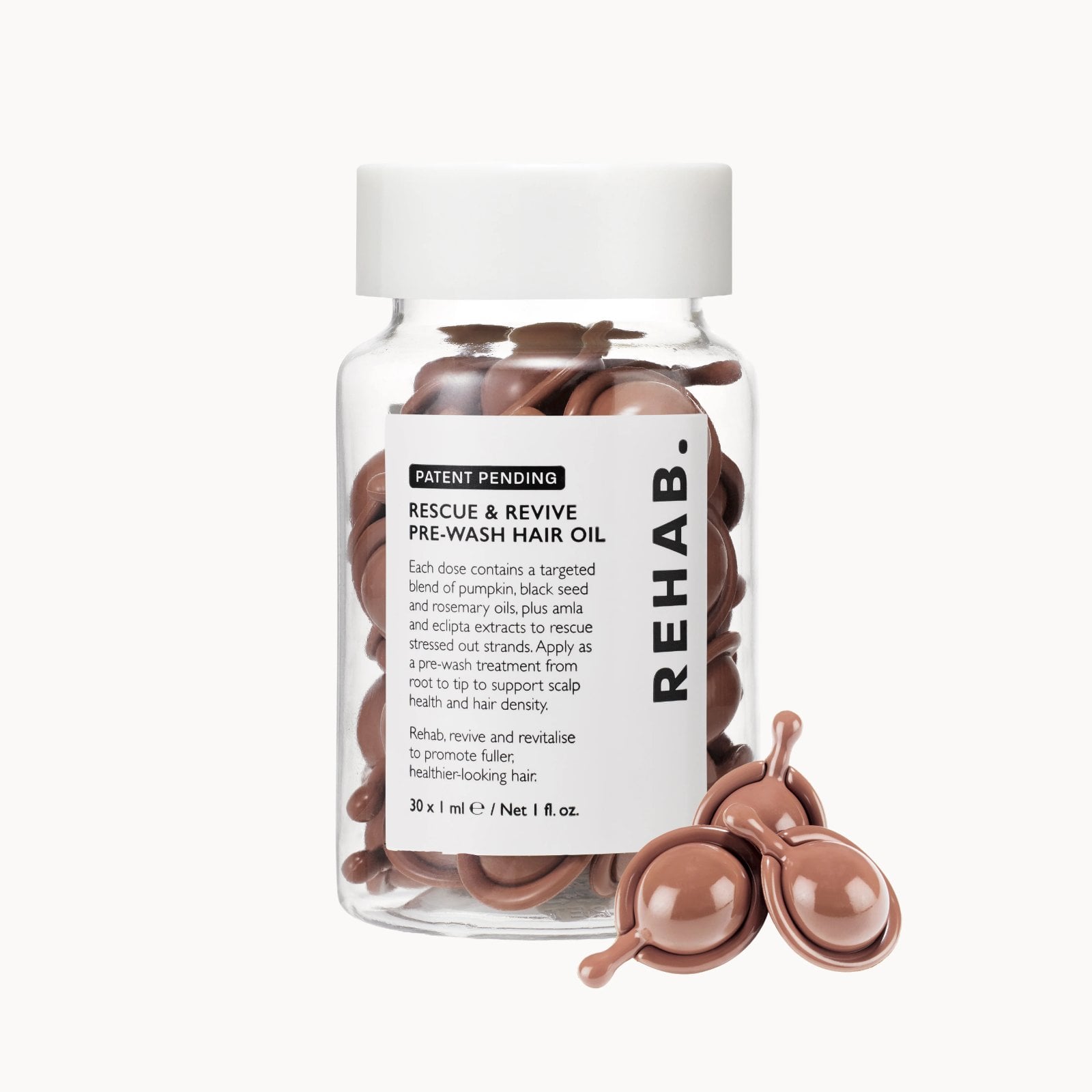 REHAB Your Hair pre-wash hair oil bottle