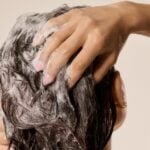 Close view of soapy wet hair during washing