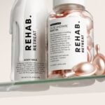 REHAB Time to Retreat skincare products in a lifestyle setting