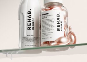 REHAB Time to Retreat skincare products in a lifestyle setting