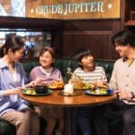 Visitors enjoying food inside Warner Bros. Studios Japan